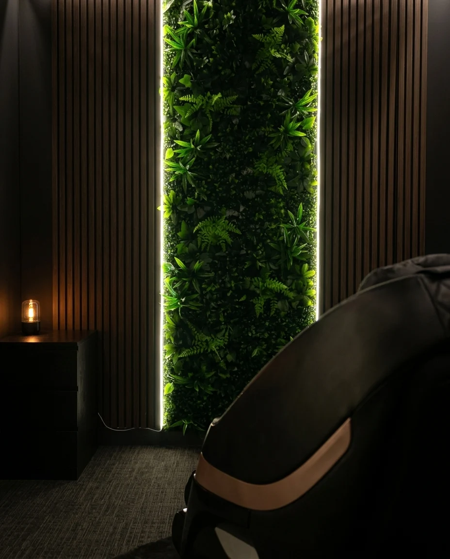 The Nervous System Regulation room at ReviveO2, with the zero-gravity chair reclined and the lights low.